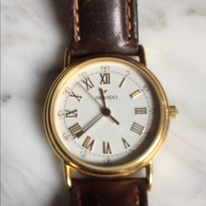 Classic Movado women’s 14k gold watch